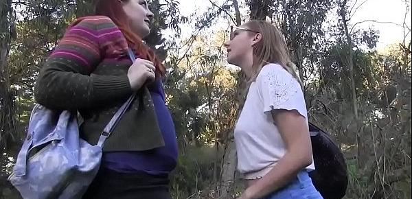  In a beautiful forest two girls masturbate deep